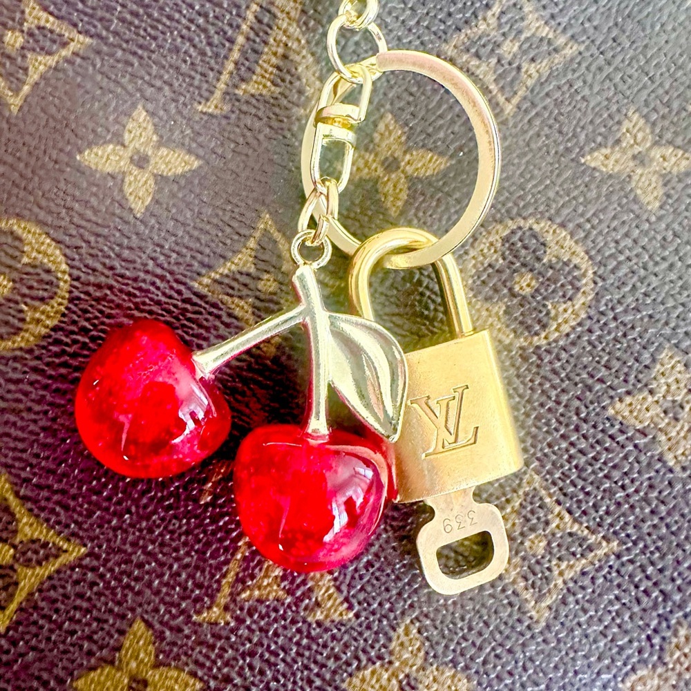 Authentic Louis Vuitton Padlock with Cherry bag charm